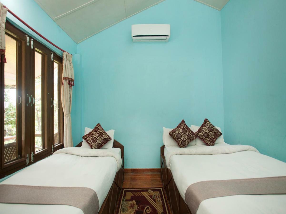 Spot On 486 Hotel Holy Lodge Sauraha Buitenkant foto